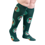 Lifestyle photo showcasing the teal knee-high 'Horsing Around' socks on a person's legs.