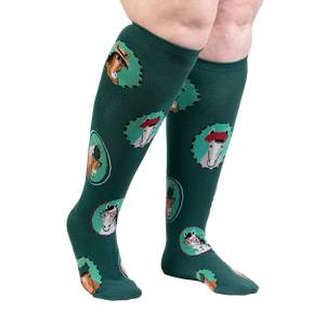 Lifestyle photo showcasing the teal knee-high 'Horsing Around' socks on a person's legs.