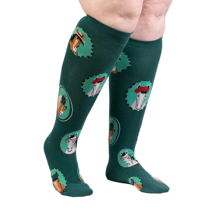 Lifestyle photo showcasing the teal knee-high 'Horsing Around' socks on a person's legs.