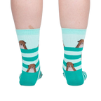 Back view of the otter socks on a model, showing the design on the back of the socks.