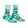 Crew socks in teal and mint green stripes featuring adorable otter designs. Otters are shown peeking from behind the stripes.