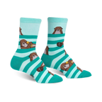 Crew socks in teal and mint green stripes featuring adorable otter designs. Otters are shown peeking from behind the stripes.