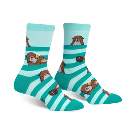 women's crew-length socks featuring a pattern of sea otters holding yellow and orange fish.  