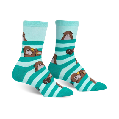 women's crew-length socks featuring a pattern of sea otters holding yellow and orange fish.  