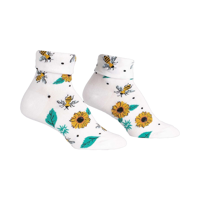 Lifestyle shot showing the 'Yas Queen' socks on a model's feet.  Focus on the fun sock design.