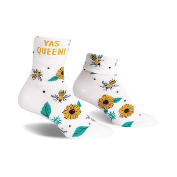 white crew socks with sunflowers, bees, and leaves pattern and "yas queen!" text.   