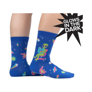 Lifestyle shot of a person wearing the InterGalactic Reading List socks, showing how they look on feet.
