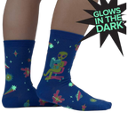 Lifestyle shot of the socks glowing in the dark, highlighting the glow-in-the-dark feature.