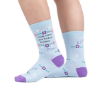 Lifestyle shot showing the socks on a person's legs, highlighting their fit and style.