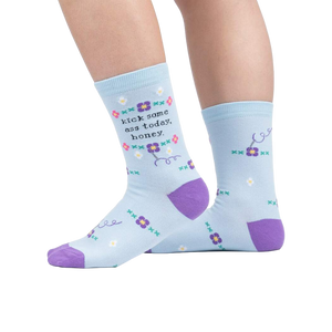 Lifestyle shot showing the socks on a person's legs, highlighting their fit and style.