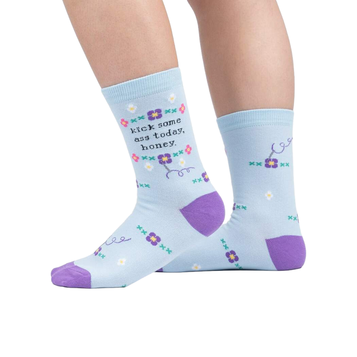 Lifestyle shot showing the socks on a person's legs, highlighting their fit and style.