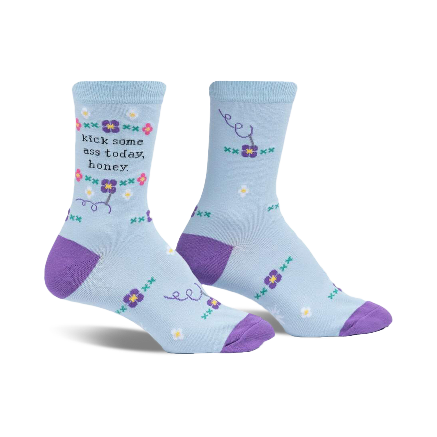 Pair of light blue crew socks with purple cuffs. Features a 'Kick some ass today, honey' message and small floral accents.