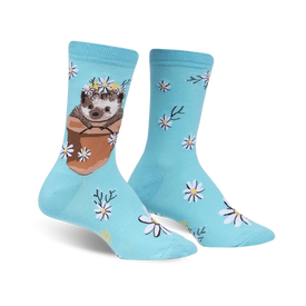 blue crew socks with white, yellow and green floral pattern featuring hedgehogs wearing yellow flower crowns.   
