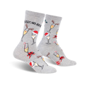 Pair of grey crew socks with a festive design. Features champagne glasses wearing Santa hats and reindeer antlers, along with candy canes and holly.