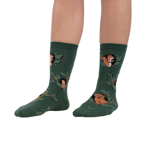 Lifestyle shot showing model wearing the Woodland Watcher socks, showcasing their fit and design.