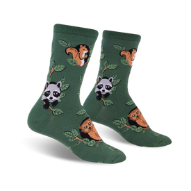 woodland watchers crew socks featuring a pattern of raccoons, owls, and squirrels climbing on branches with green leaves.  