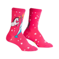 Pair of pink crew socks with a white unicorn and narwhal design battling each other. White stars are scattered across the background.