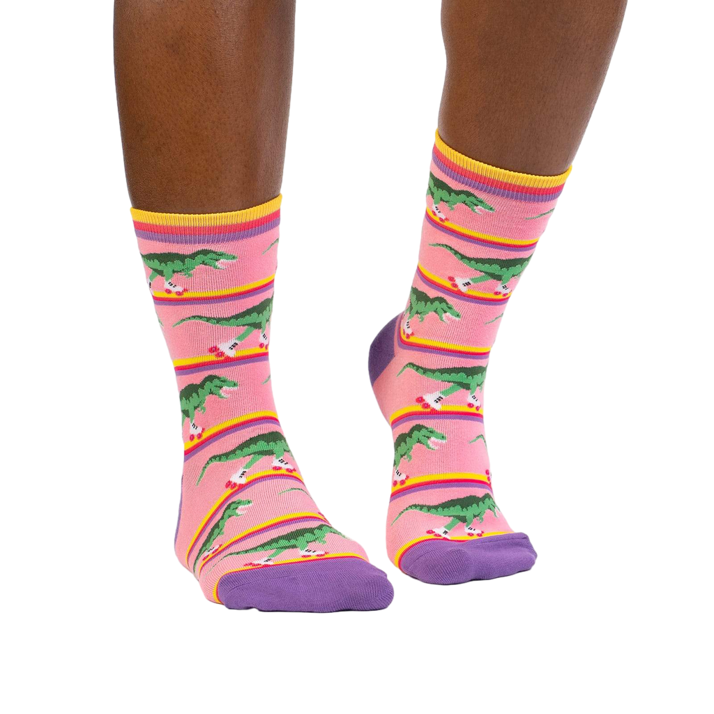 Lifestyle shot of Rawr-ler Rink socks on a person's legs, showcasing the socks' fit and pattern.