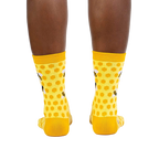 Rear view of the yellow honeycomb bee socks on a model.