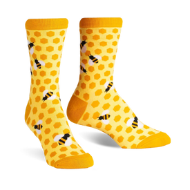 yellow crew socks featuring a black hexagon and bee pattern. perfect for women who love bees.   