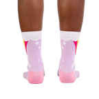 Rear view of the socks on a person's feet, highlighting the design from the back.