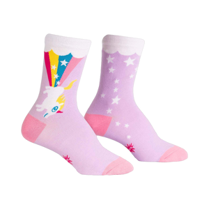 Crew socks in lavender with a whimsical design featuring a unicorn launching from a rainbow and white stars.