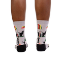 Rear view of model's legs wearing 'Booked For Meow' socks.