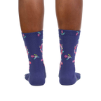 Rear view: A pair of purple floral Venus symbol crew socks shown from the back against a white background.