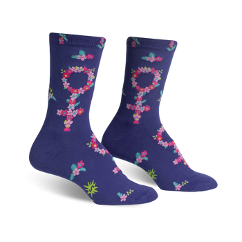 purple crew socks with pattern of pink and green flowers, symbol for female gender made of same flowers. femme-powerment theme socks for women.  