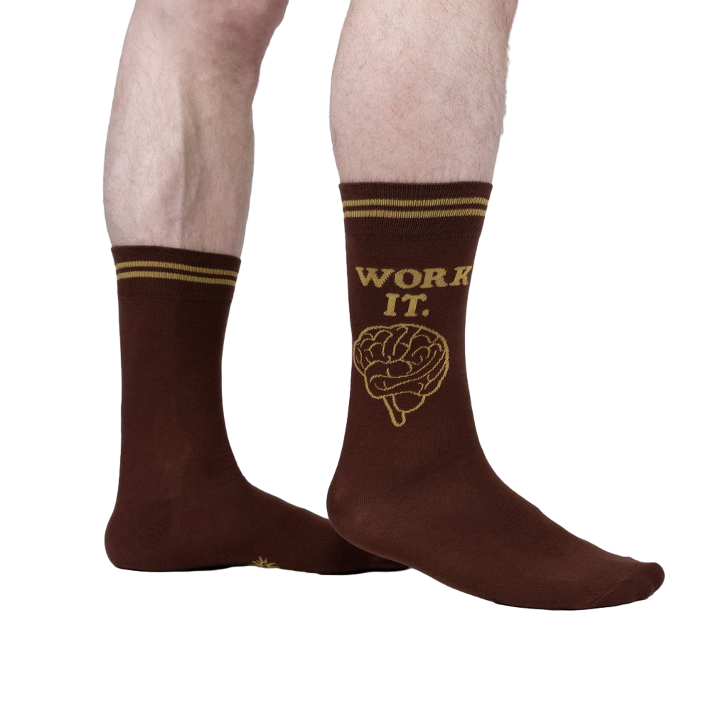 Lifestyle shot of a person wearing brown 'Work It' socks.