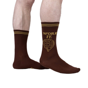 Lifestyle shot of a person wearing brown 'Work It' socks.