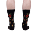 Rear view of the 'Call Me Old Fashioned' socks on a person's legs; showing the full sock design.