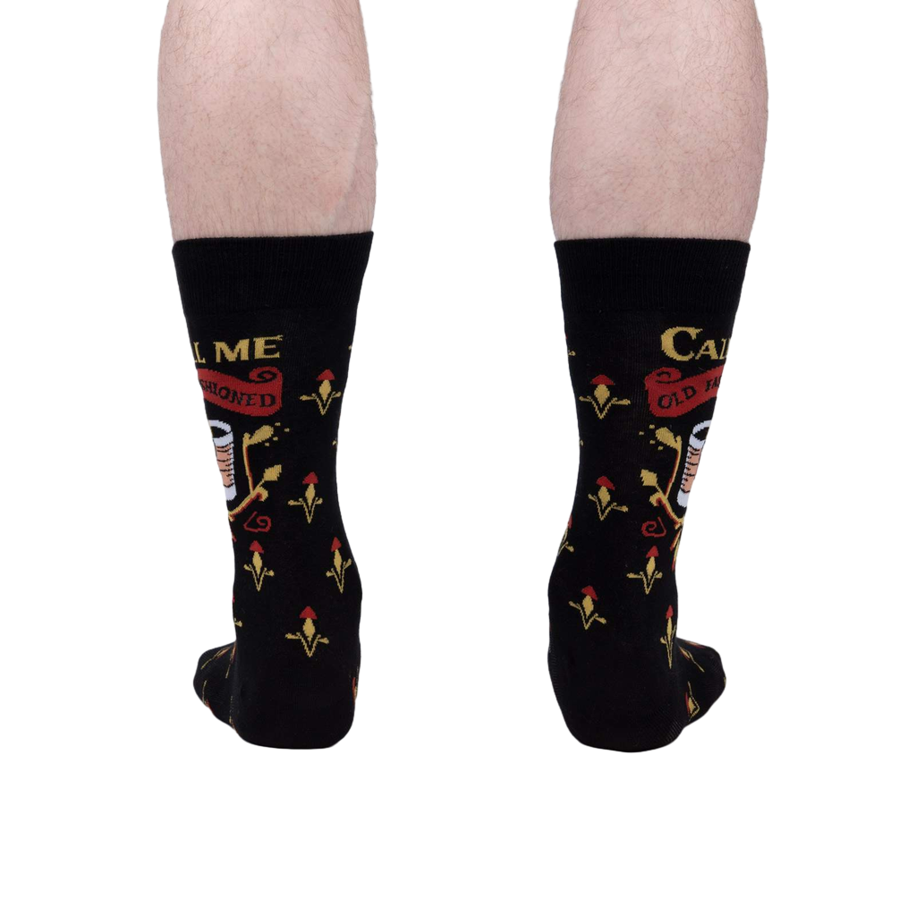Rear view of the 'Call Me Old Fashioned' socks on a person's legs; showing the full sock design.