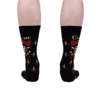 Rear view of the 'Call Me Old Fashioned' socks on a person's legs; showing the full sock design.