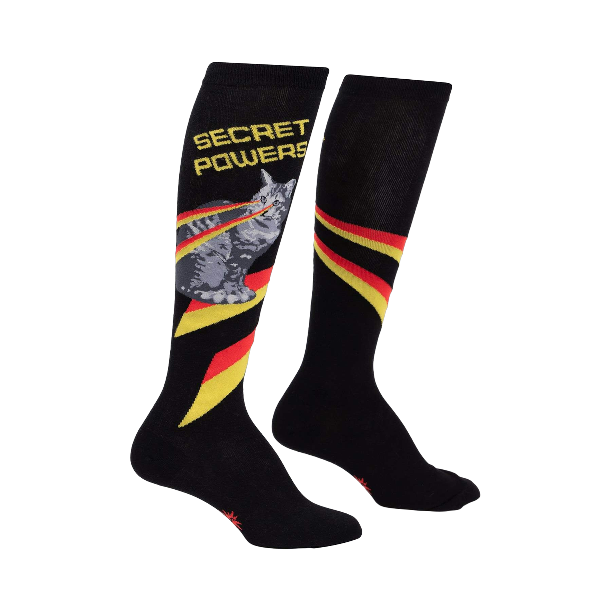 Pair of black knee-high socks. Features a grey cat shooting laser beams, 'SECRET POWERS' text, and diagonal red-yellow-gold stripes.