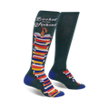 Pair of dark green knee-high socks with a colorful stack of books and the text 'Booked for the Weekend'. Blue accents at the cuffs.