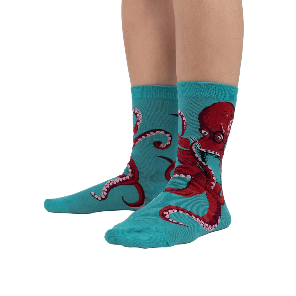 Lifestyle shot showing The Octive Reader socks on a person's feet, showcasing the fit and teal color.