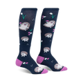 Pair of navy blue knee-high socks with a repeating pattern of cute hedgehogs and pink flowers.  Pink heel and toe.
