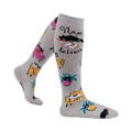 Lifestyle shot of a person wearing the 'Nap Leisure' knee-high socks, showcasing the design and fit.