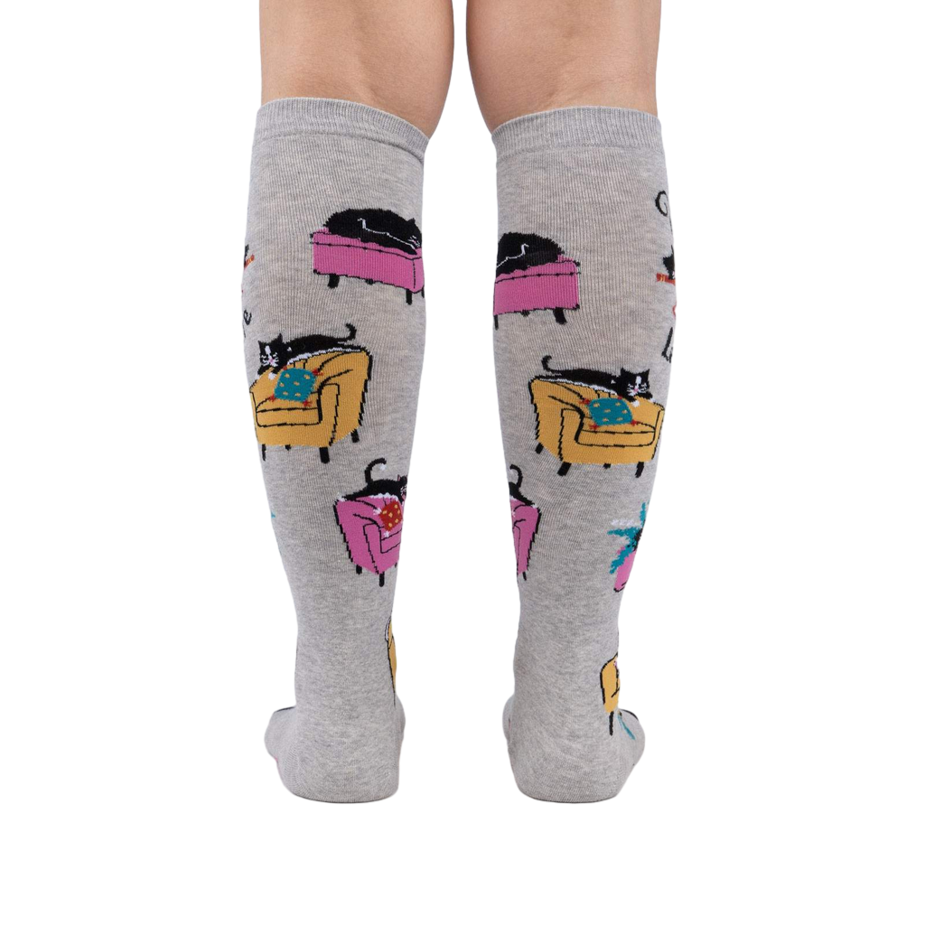 Back view of the 'Nap Leisure' knee-high socks on a person's legs, showing the full design and pattern repeat.