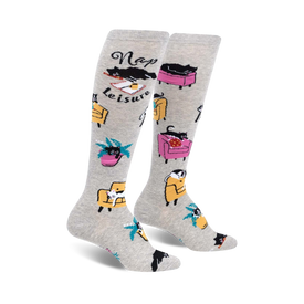 gray cat nap leisure knee-high socks with black cats on pink and yellow furniture.   