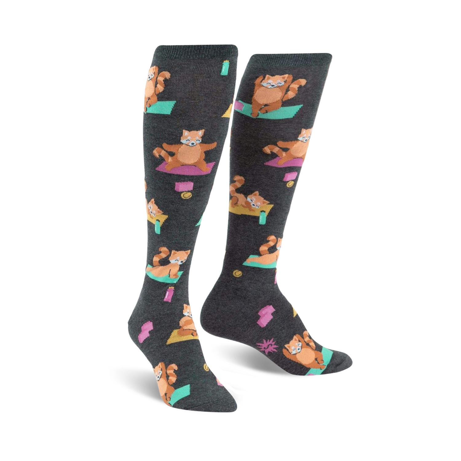 Pair of charcoal gray knee-high socks featuring a repeating pattern of red pandas doing yoga poses on teal yoga mats. 