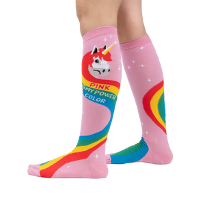 Lifestyle shot showing the Rainbow Mane socks on a model's legs.