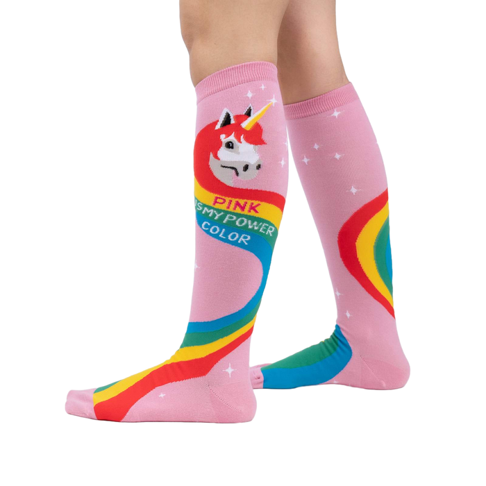 Lifestyle shot showing the Rainbow Mane socks on a model's legs.