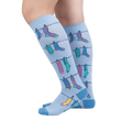 Lifestyle shot of a person wearing the Socks on Socks knee-high socks, showing the socks on their legs against a white background.
