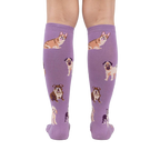 Back view of a person wearing the lavender purple knee-high socks. The dog illustrations are visible.