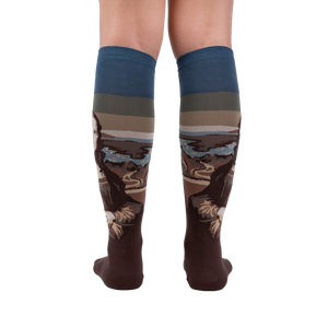 Back view of a pair of Mona Lisa socks lying flat, showcasing full design.