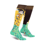 Pair of women's knee-high socks.  One side features Klimt's The Kiss in gold and brown, the other a teal floral pattern.  Brown cuff with gold shimmer.
