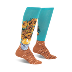 Pair of teal knee-high socks with a colorful sunflower design based on Van Gogh's painting.  Brown accents at the bottom.