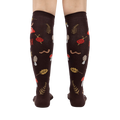 Rear view of 'Down to Earth' knee-high socks showing the full pattern and design on the back of the socks.